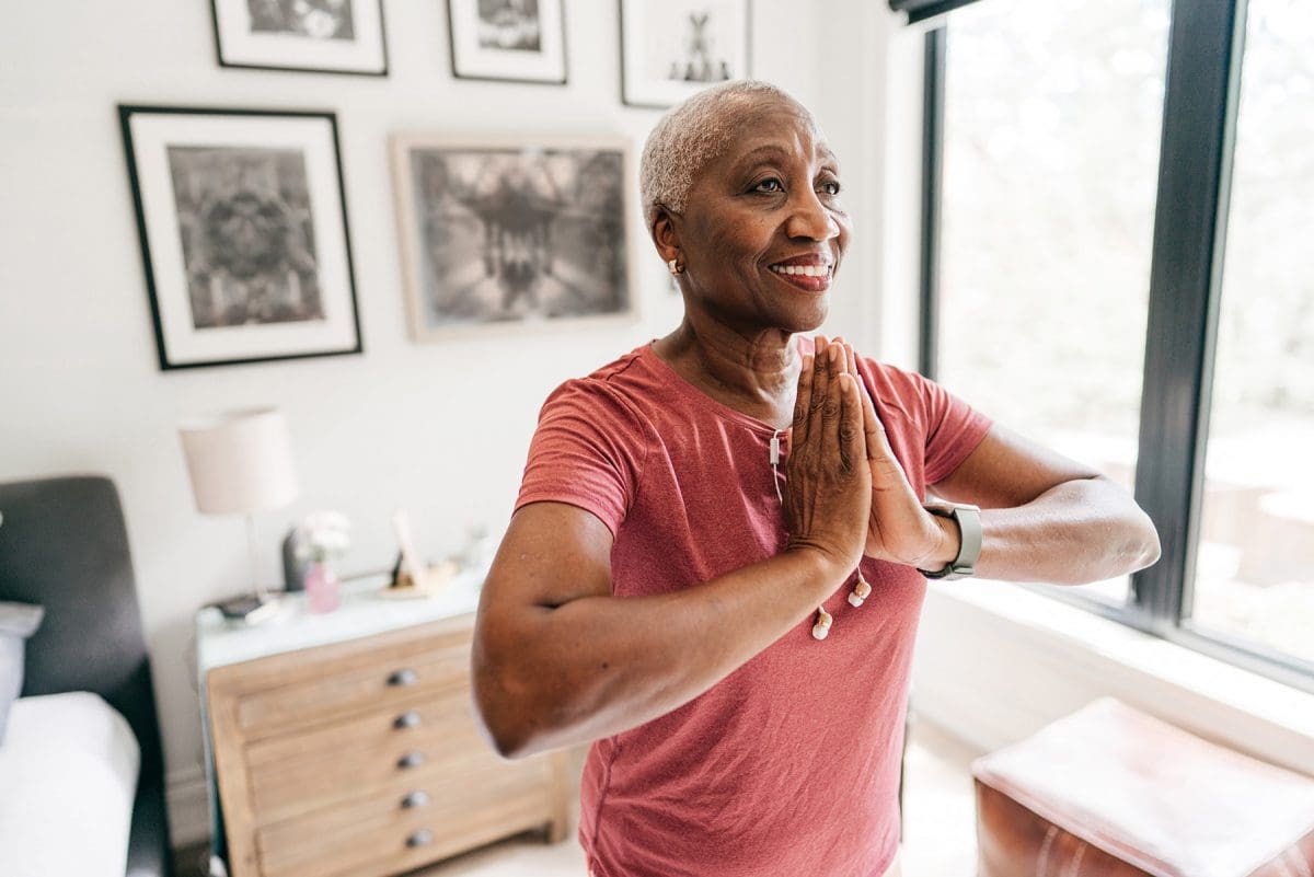 Senior woman in a tai chi pose