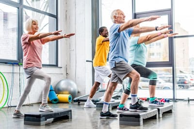 Group of seniors exercising together