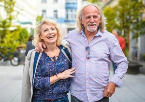 Senior Man Walking With His Lovely Wife