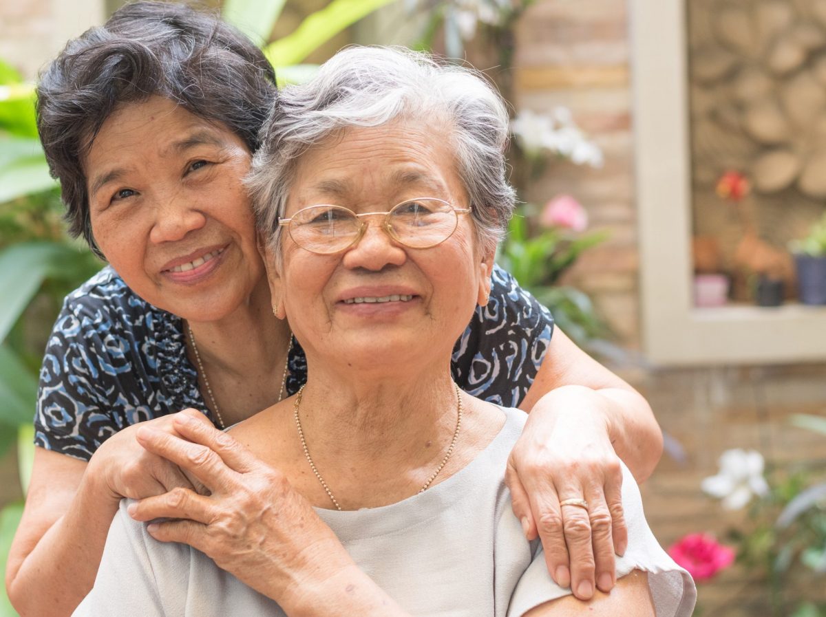 Senior women smiling with happiness in garden at home