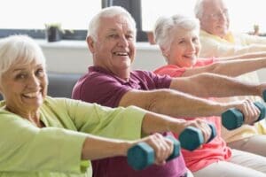 a group of seniors participating in an exercise class