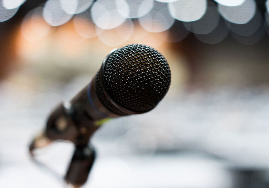 close up of a microphone on stage