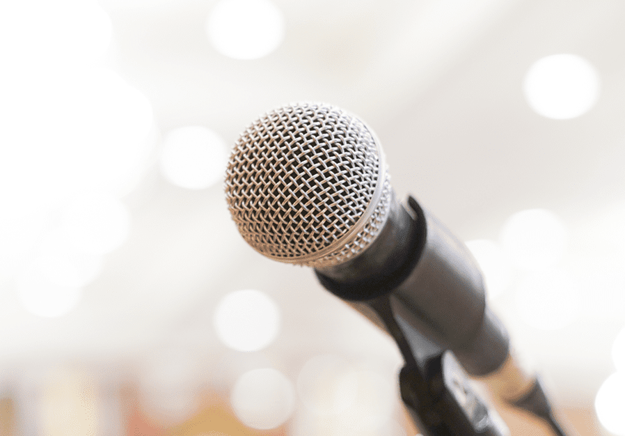 close up of a microphone on stage