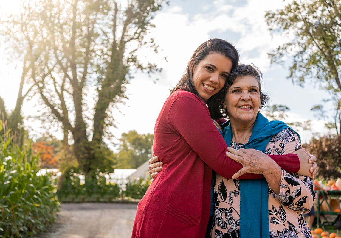 Mother and daughter together smiling