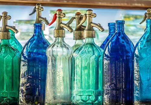 antique bottles on a shelf
